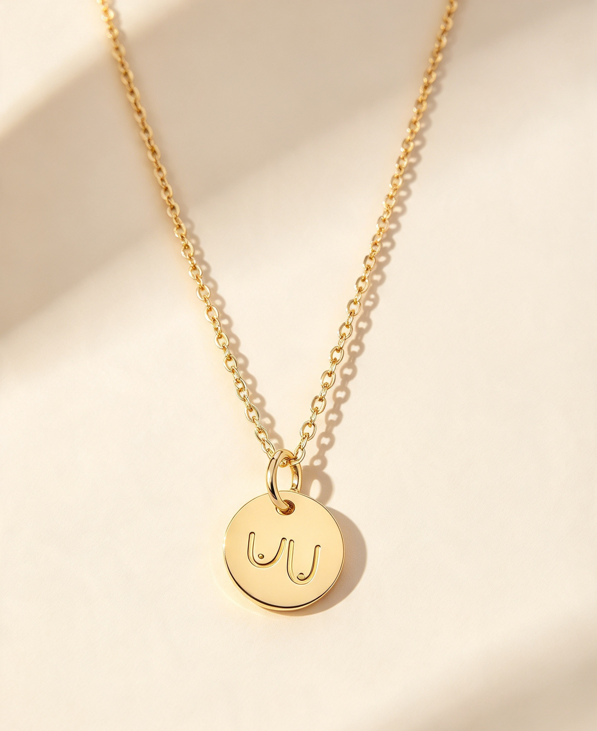 ONE BOOB BIGGER THAN THE OTHER NECKLACE
