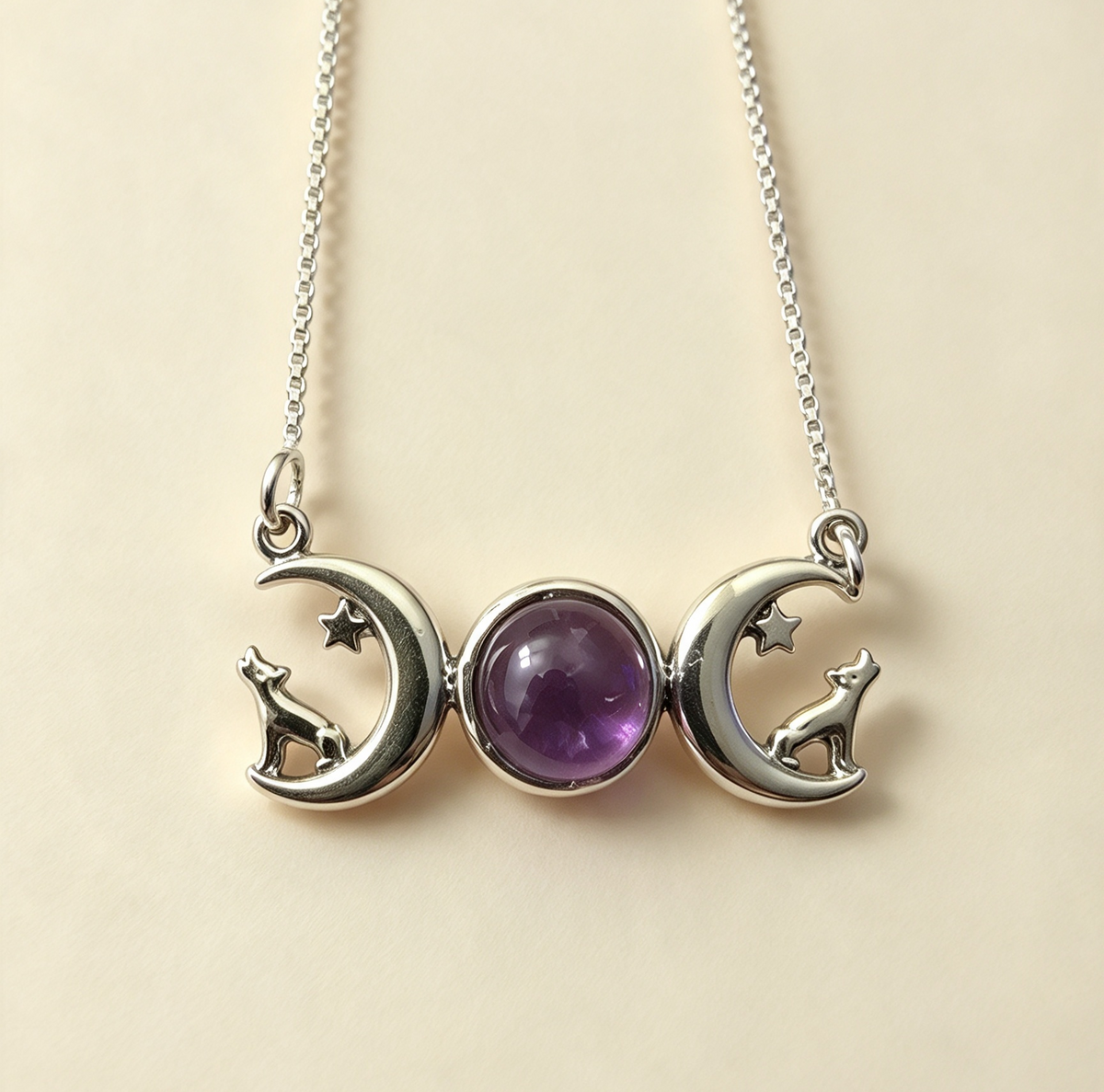 AMETHYST WITH HOWLING WOLVES ON A TRIPLE MOON IN 925 STERLING SILVER 1.4cm by 1.7cm