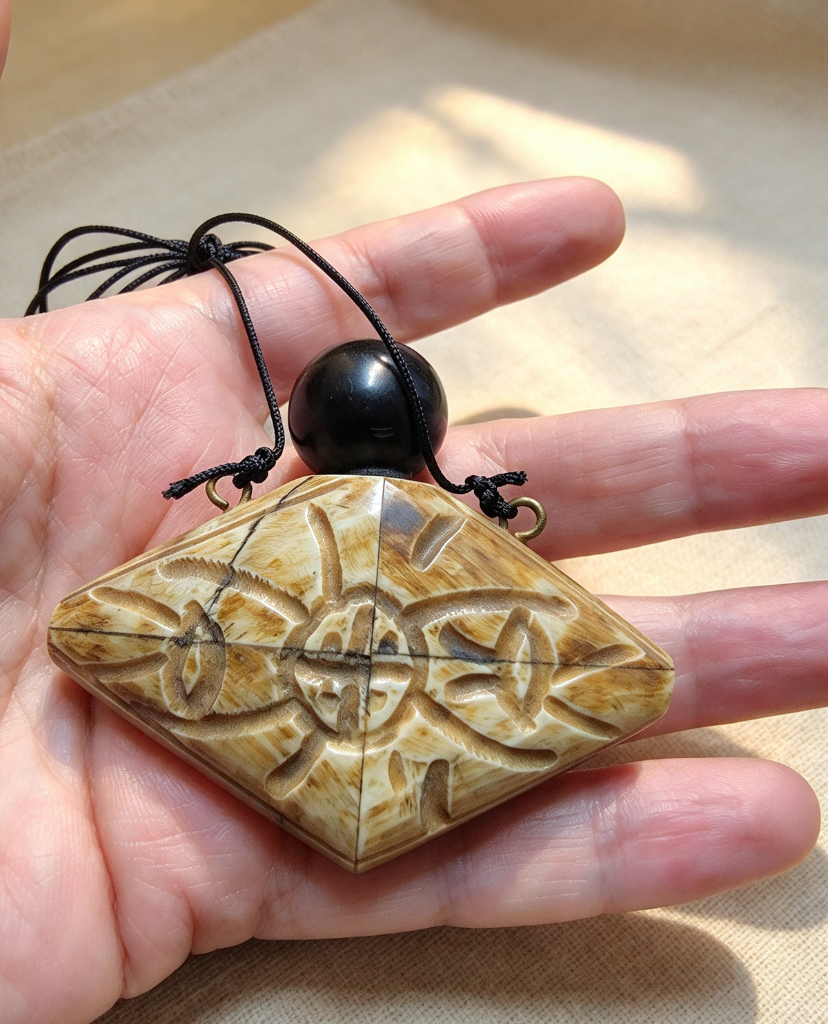 Medieval bone poison bottle necklace