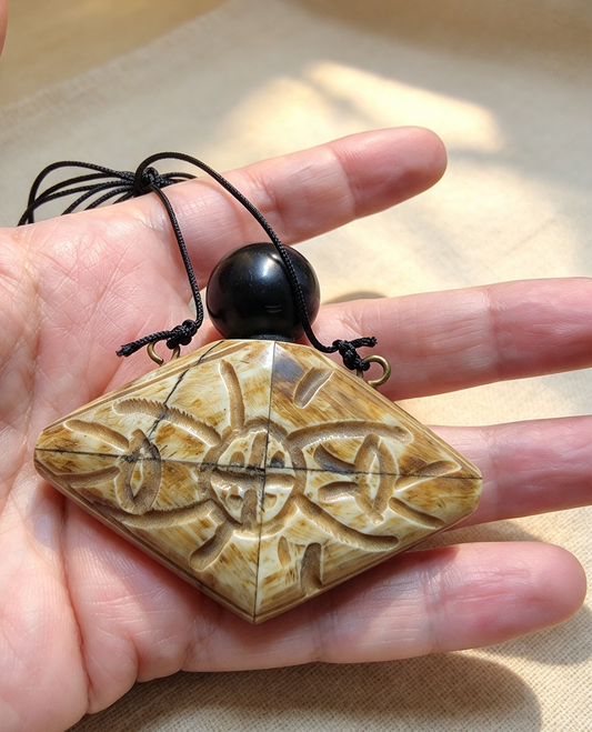Medieval bone poison bottle necklace