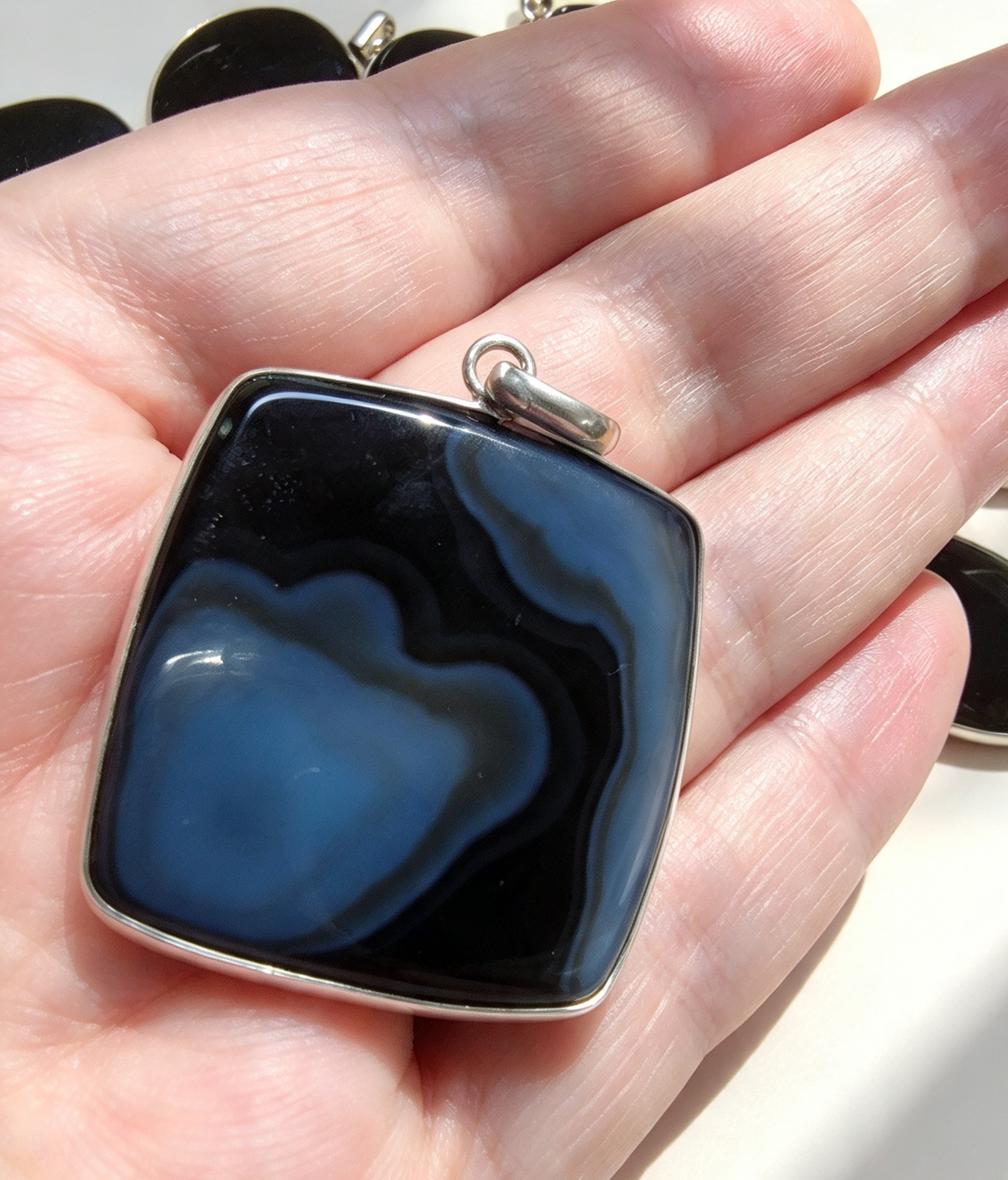 NATURAL ONYX PENDANT Silver plated. Free stainless steel chain. Random Pendant sent.