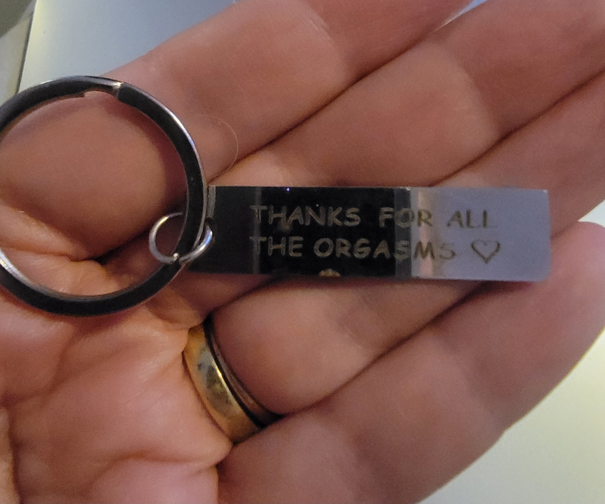Rude keyring sale item .mild scratches