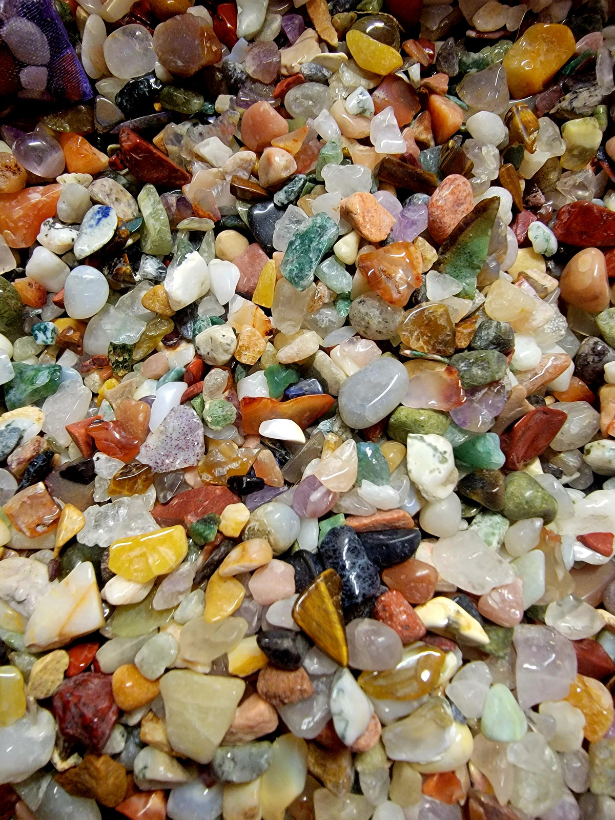 1 BAG OF TEENY WEENY TINY GEMSTONES.
