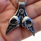 STAINLESS STEEL RAVEN PENDANT FREE STAINLESS STEEL CHAIN.