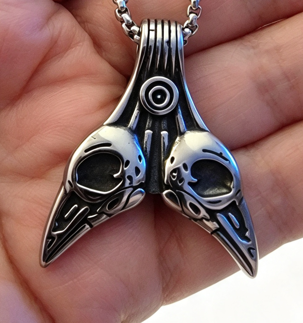 STAINLESS STEEL RAVEN PENDANT FREE STAINLESS STEEL CHAIN.
