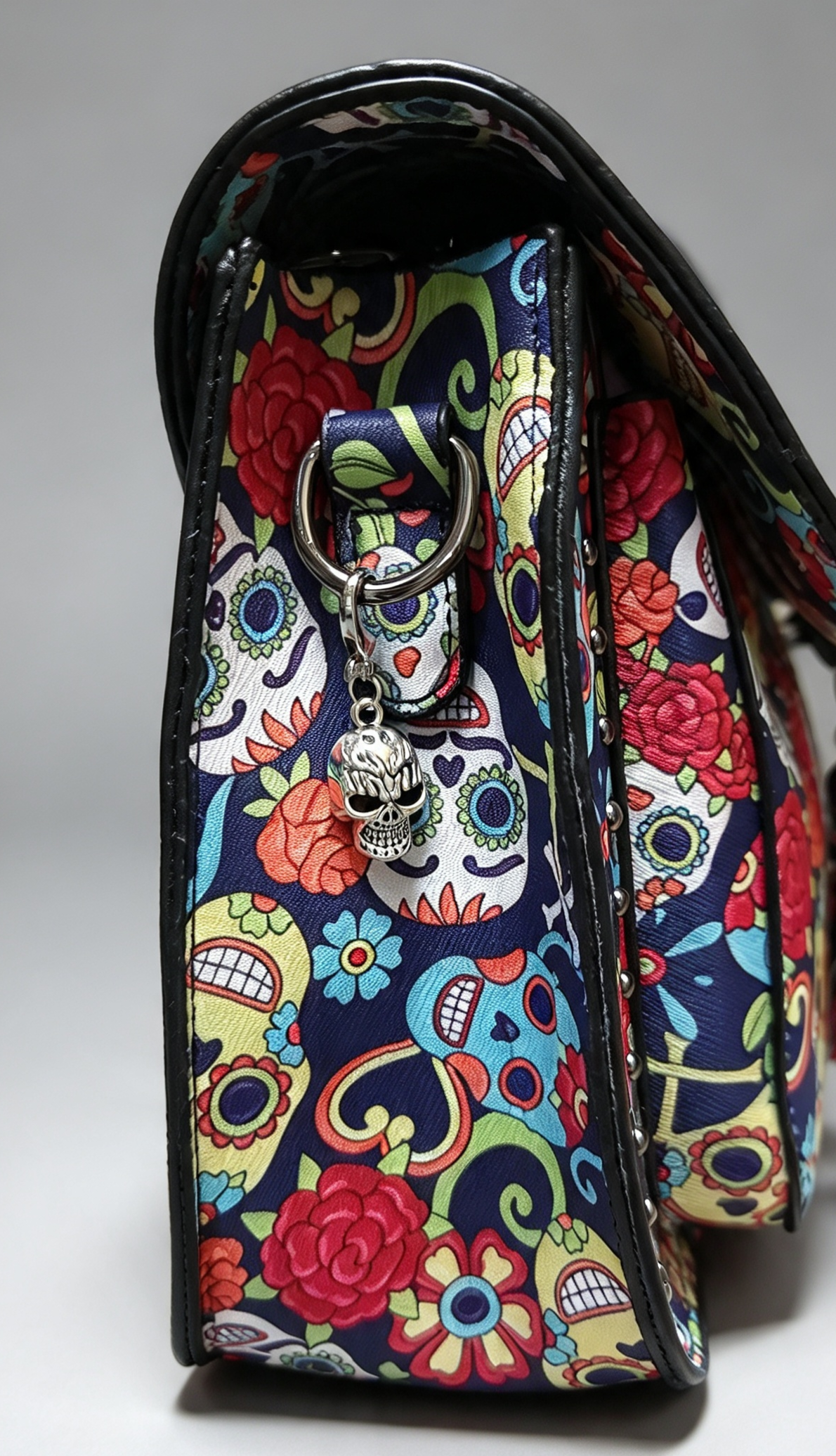 The day of the dead bag comes with a long adjustable strap