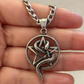 STAINLESS STEEL PENTAGRAM WITH SNAKE PENDANT FREE STAINLESS STEEL CHAIN.
