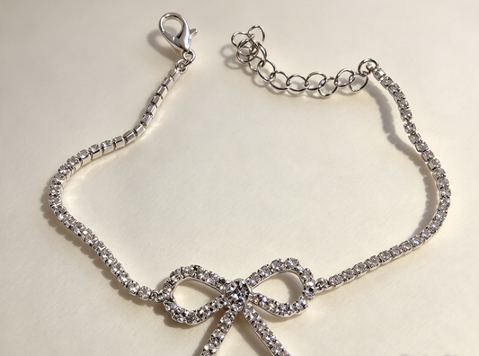 Sparkly bow bracelet sale item