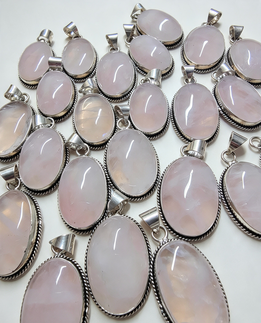 NATURAL ROSE QUARTZ PENDANT Silver plated. Supplied with a free stainless steel chain . Random Pendant sent .