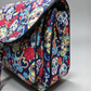 The day of the dead bag comes with a long adjustable strap