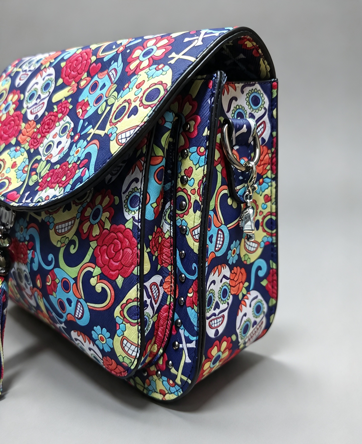 The day of the dead bag comes with a long adjustable strap