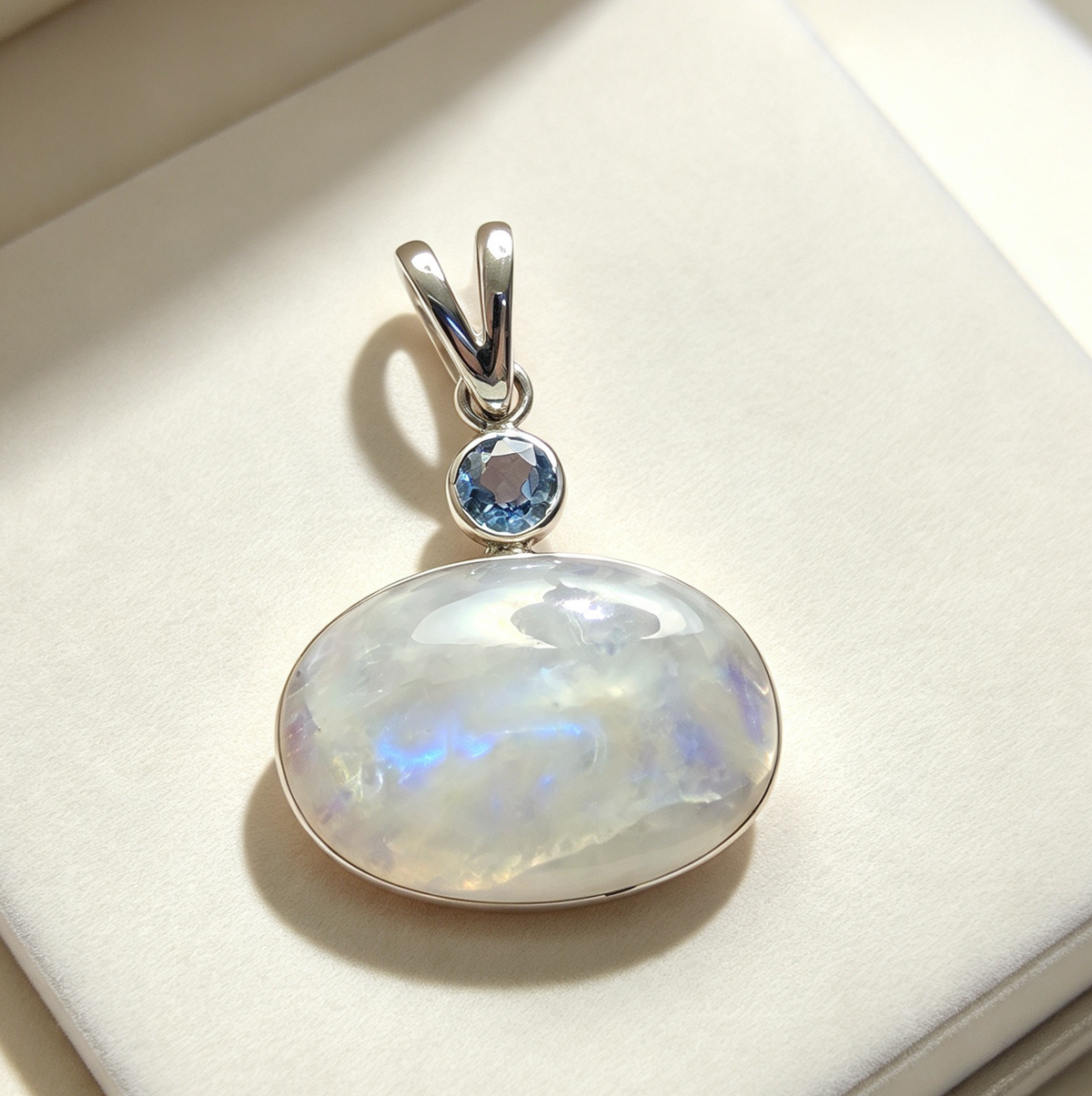 925 Sterling Silver Pendant .. Rainbow Moonstone and Blue Topaz Set In 925 Sterling Silver 3.5cm by 2.5cm.