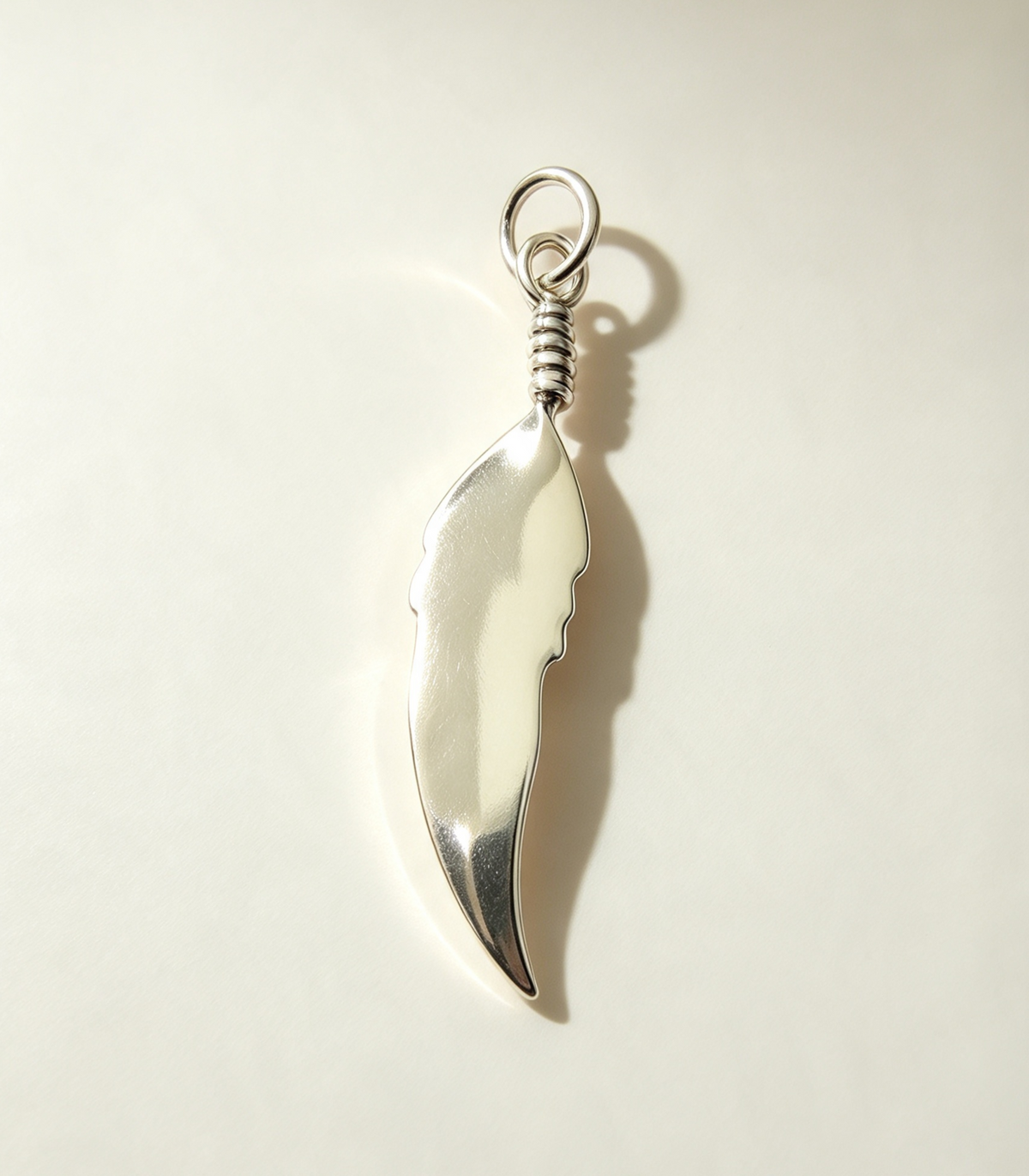 925 Sterling Silver Pendant...Feather 3.8cm by 0.8cm.