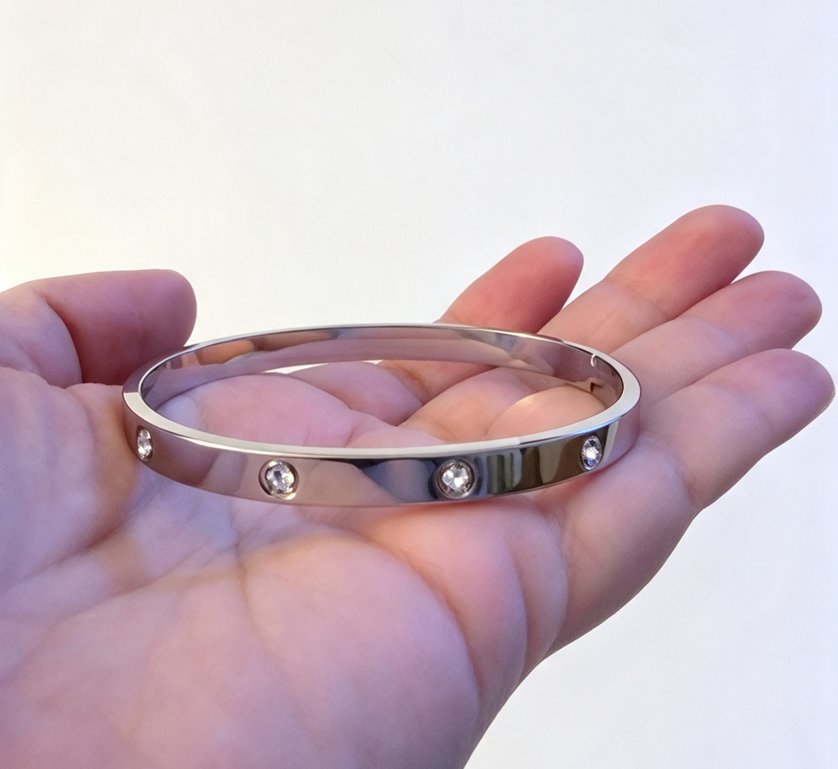 STAINLESS STEEL BRACELET. OPENING CLASP