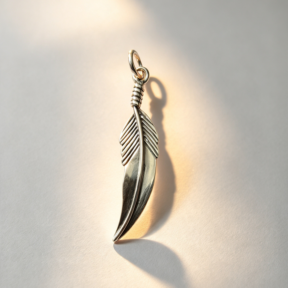 925 Sterling Silver Pendant...Feather 3.8cm by 0.8cm.