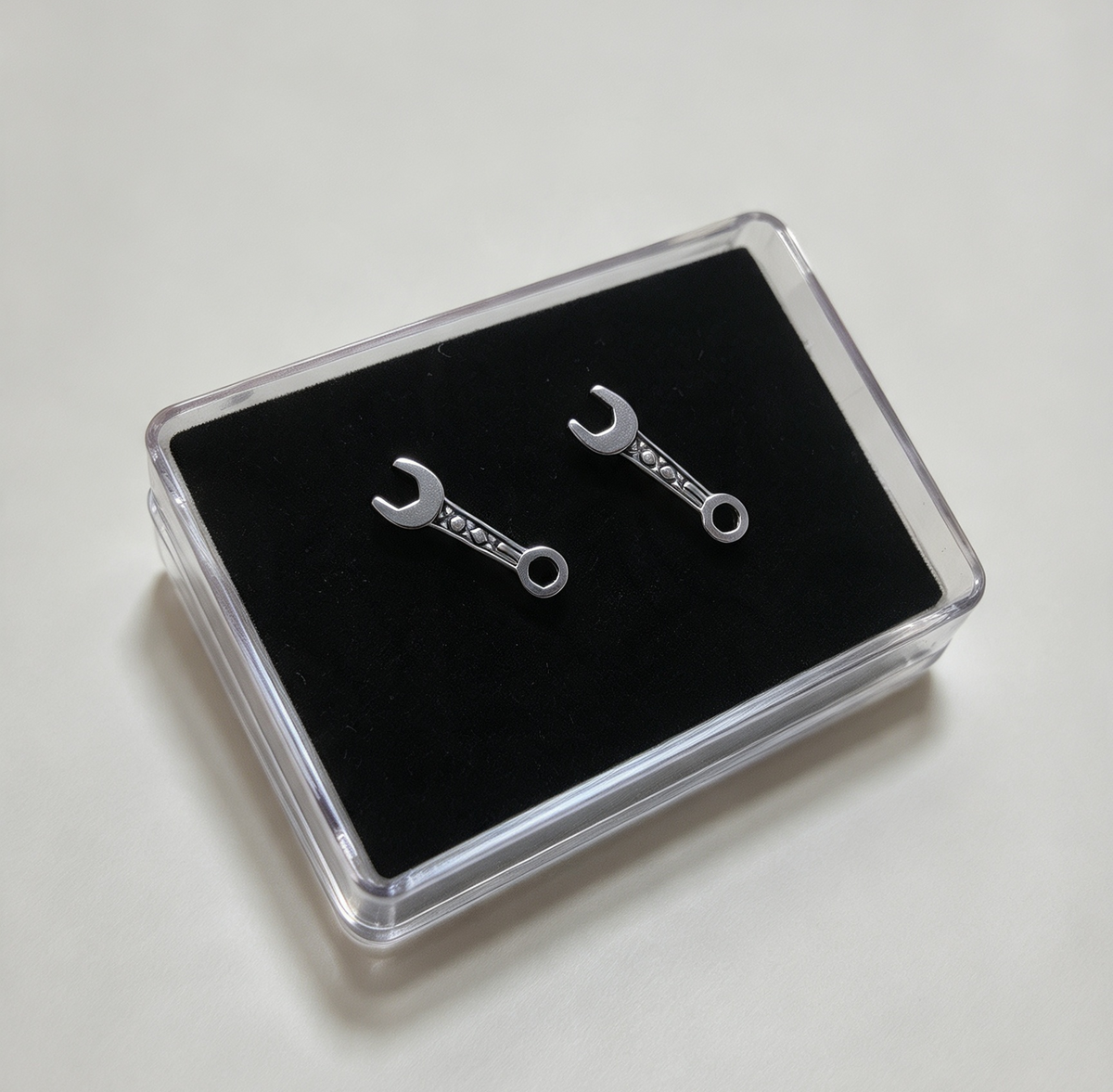 STAINLESS STEEL SPANNER EARRINGS. FLAT SCREW ON BACKS
