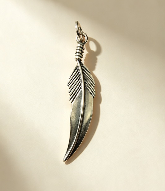925 Sterling Silver Pendant...Feather 3.8cm by 0.8cm.