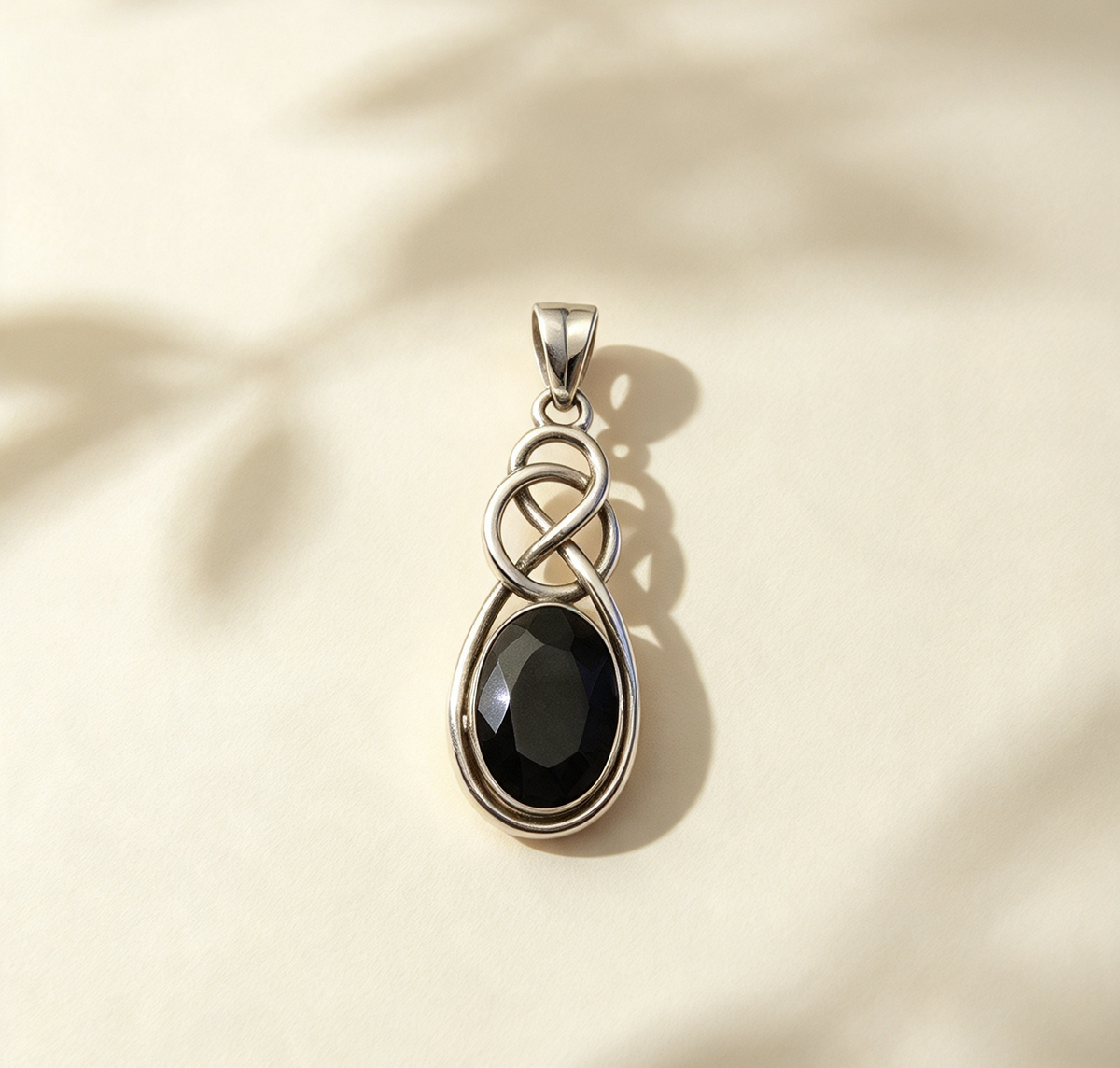 SMALL ... OBSIDIAN SET IN STERLING SILVER PENDANT 4cm
