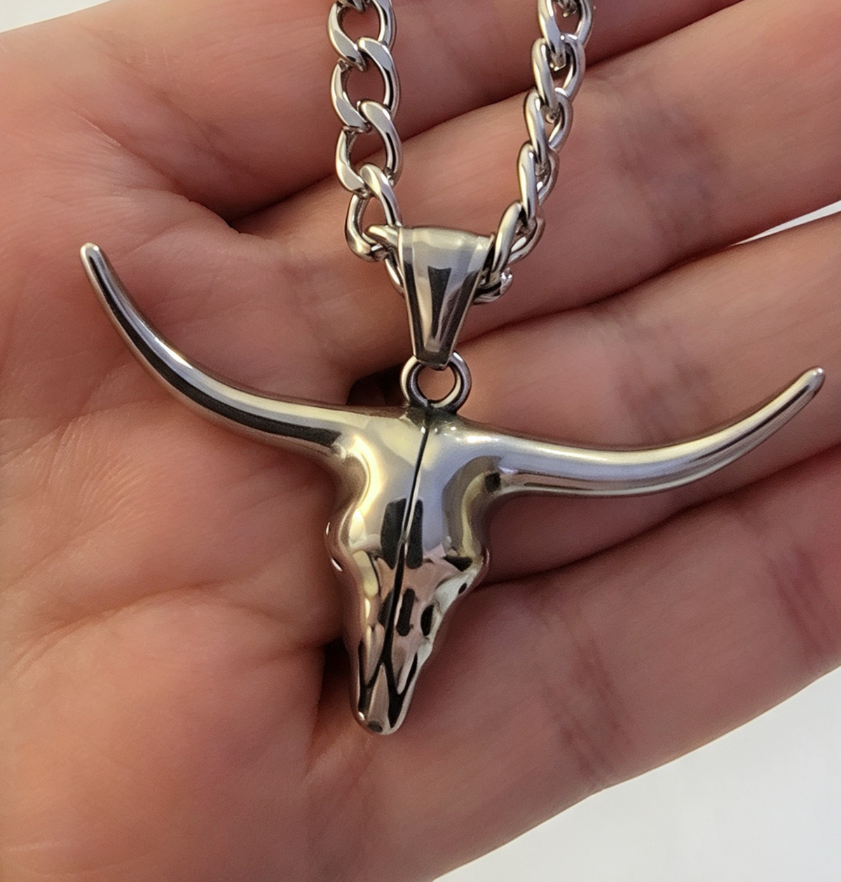 STAINLESS STEEL RAM PENDANT FREE STAINLESS STEEL CHAIN.