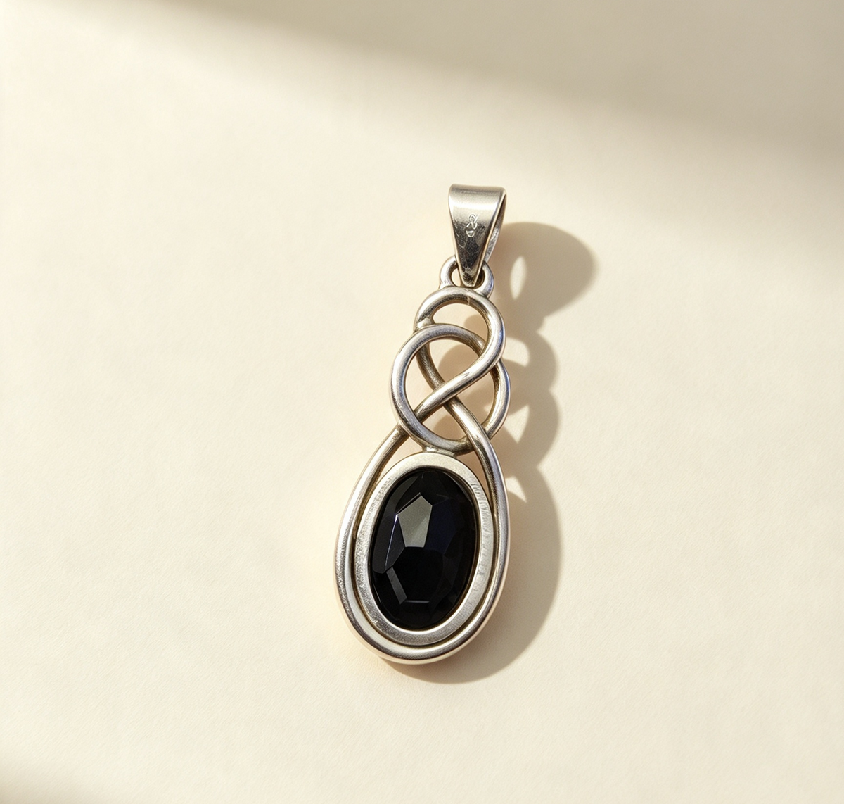 SMALL ... OBSIDIAN SET IN STERLING SILVER PENDANT 4cm