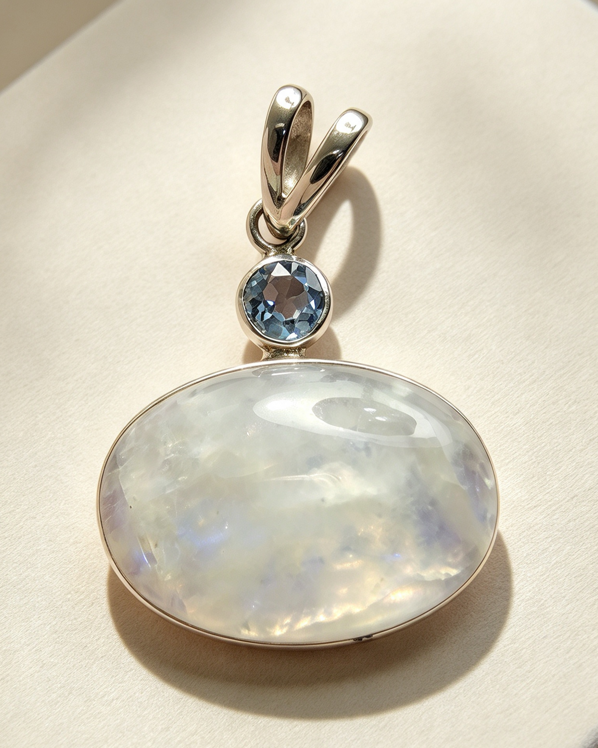 925 Sterling Silver Pendant .. Rainbow Moonstone and Blue Topaz Set In 925 Sterling Silver 3.5cm by 2.5cm.