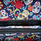 The day of the dead bag comes with a long adjustable strap