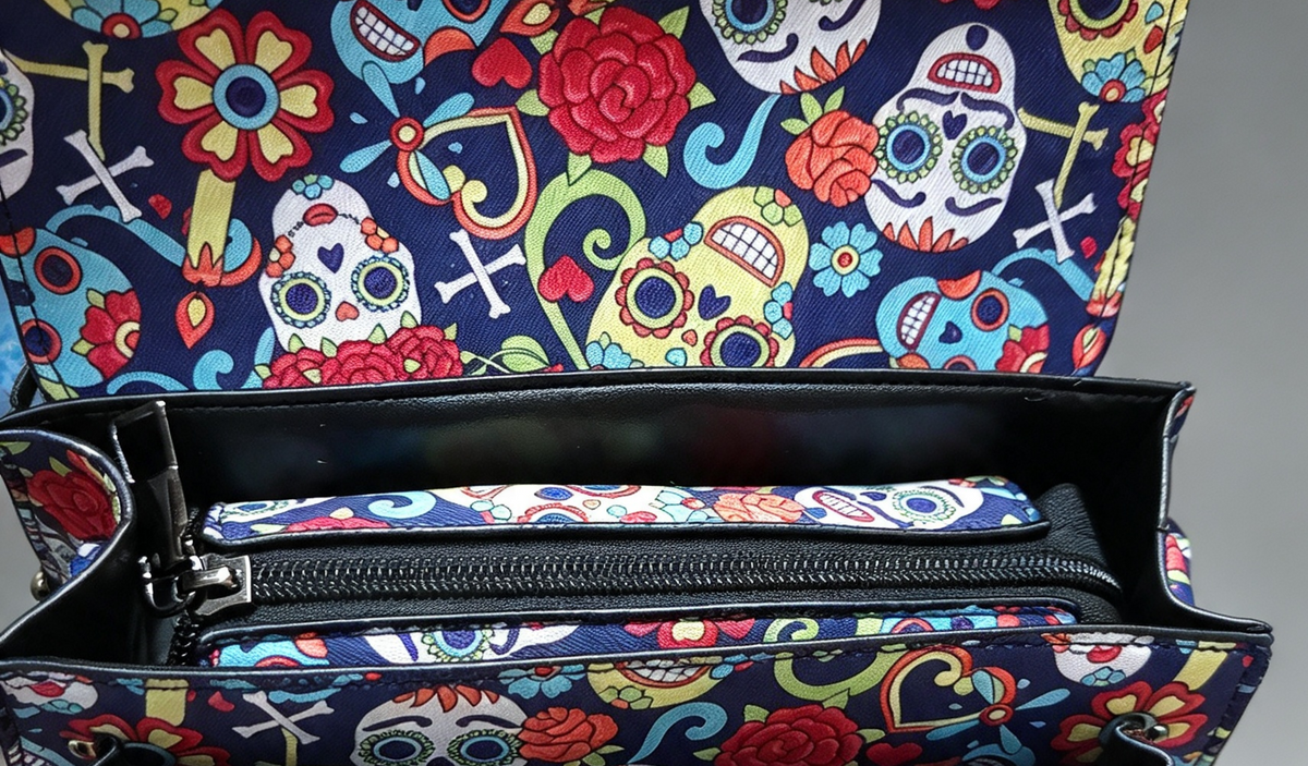 The day of the dead bag comes with a long adjustable strap