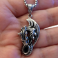 STAINLESS STEEL DRAGON PENDANT WITH OBSIDIAN FREE STAINLESS STEEL CHAIN.